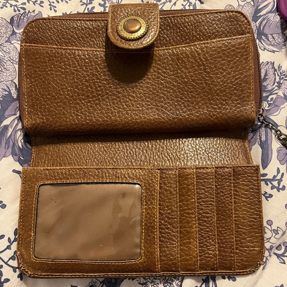 Woman’s brown wallet